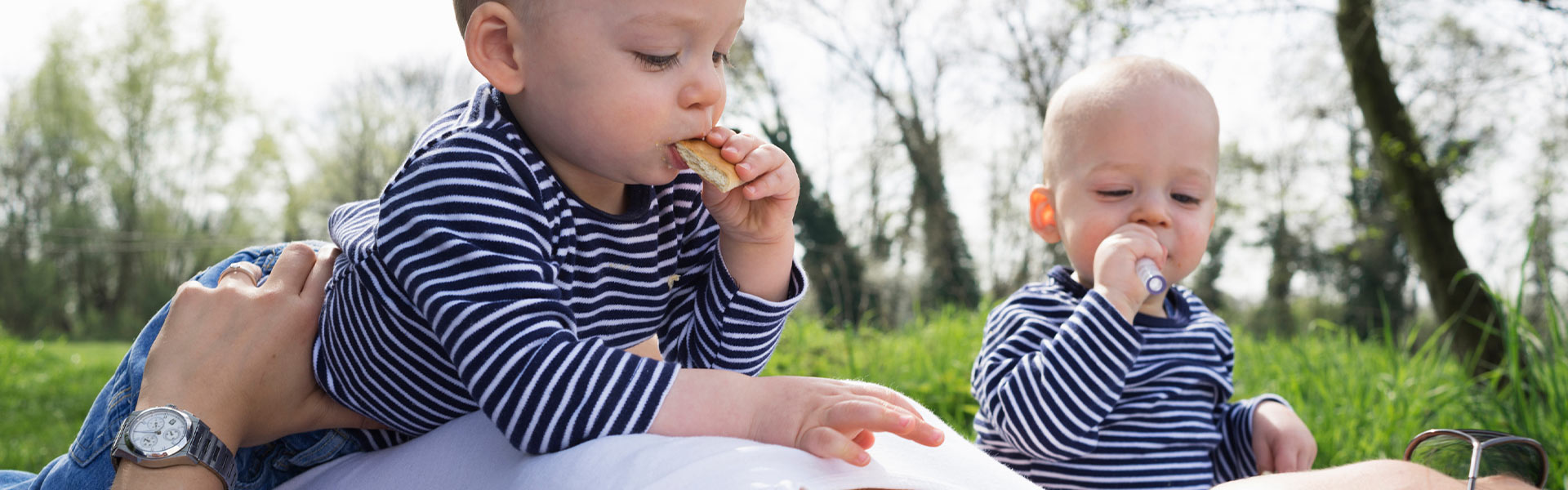 Mother with babies outdoors